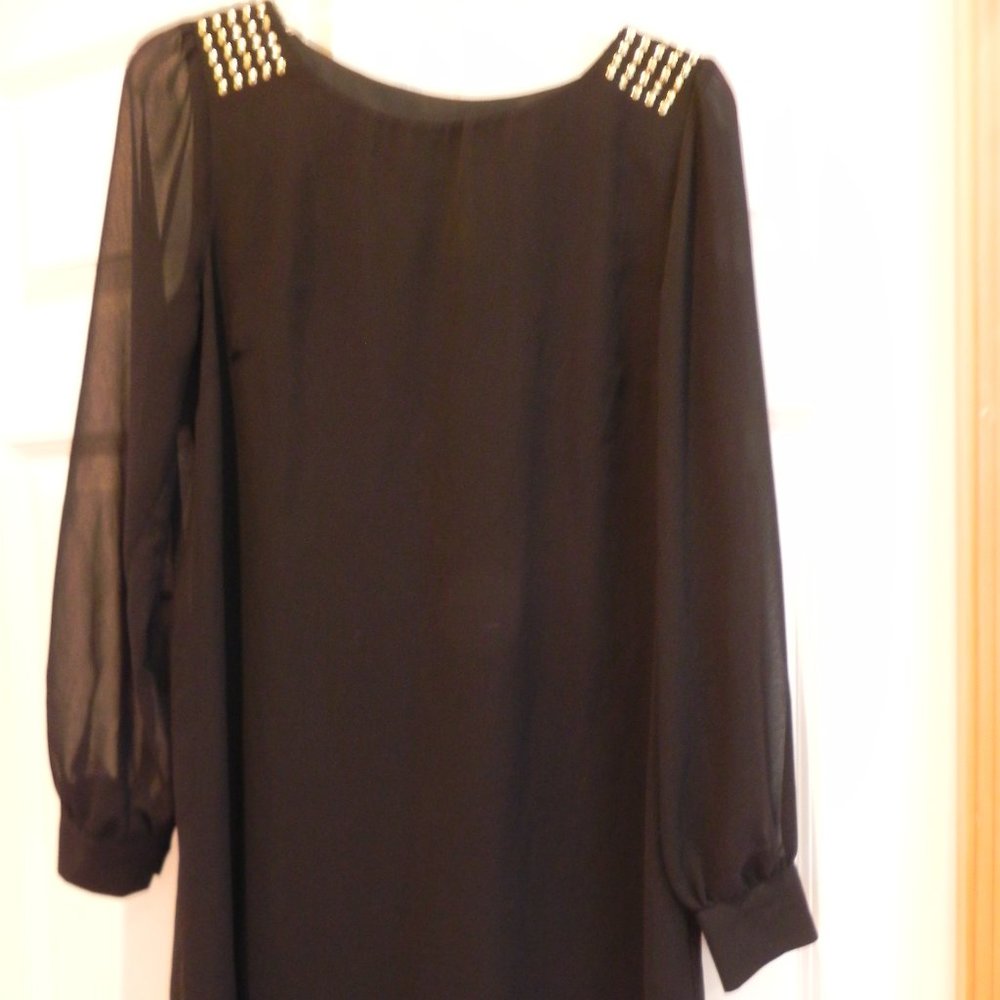 Atmosphere black dress size 8 Gold studs on shoulders sheer long sleeves, lined.